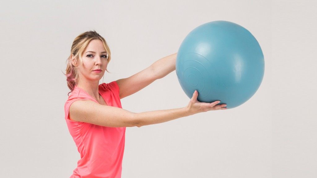 5 Easy Toning Ball Exercises To Slim Down Your Arms