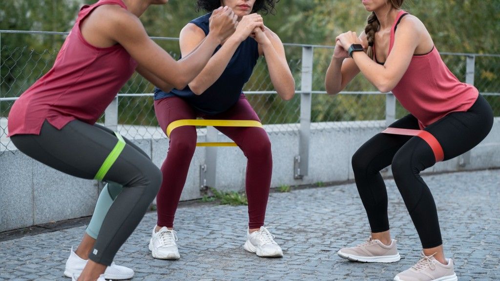 Tired of Running to Burn Fat? Do These 6 Strength Moves Instead 5 Resistance Band Pallof Press