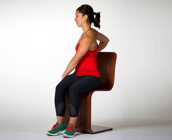 Get Fit at Home: 5 Chair Exercises for Strength and Fat Loss 3 Seated Marching Twists