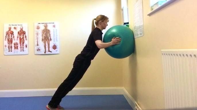 5 Easy Toning Ball Exercises To Slim Down Your Arms 6 Wall Push-Up with Ball Roll
